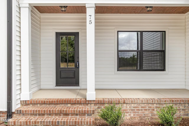 7327 Shawan Rd, Wendell, NC 27591 - doorway to property featuring covered porch