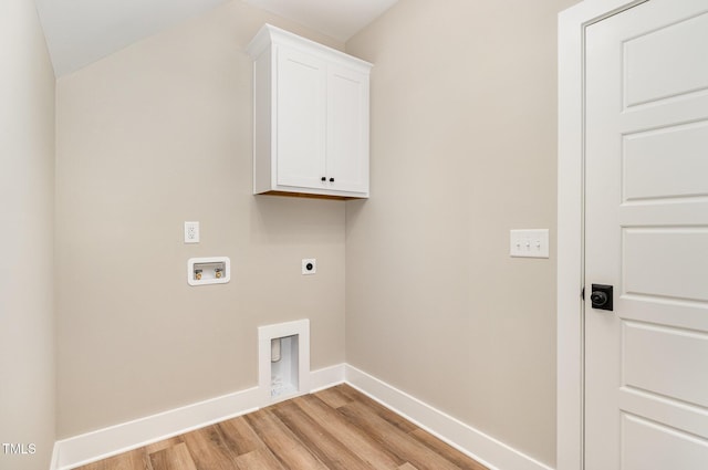 7327 Shawan Rd, Wendell, NC 27591 - laundry area with hookup for an electric dryer, light wood-type flooring, hookup for a washing machine, baseboards, and cabinet space