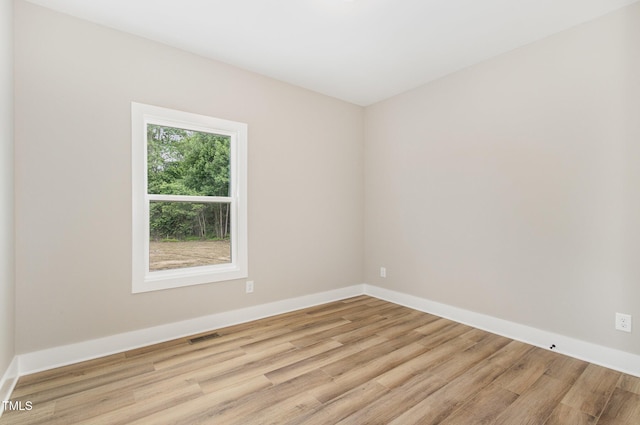7327 Shawan Rd, Wendell, NC 27591 - spare room with wood finished floors and baseboards