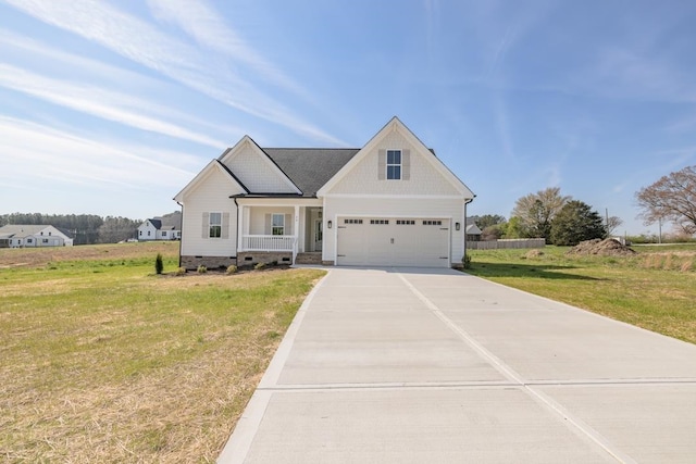 view of front facade featuring covered porch, a front lawn, and a garage