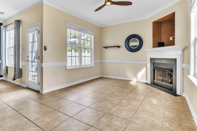 unfurnished living room featuring ceiling fan, light tile patterned flooring, and ornamental molding