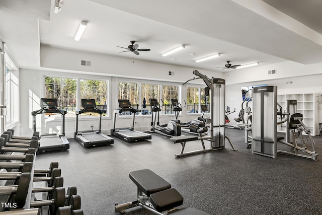 exercise room featuring ceiling fan and visible vents