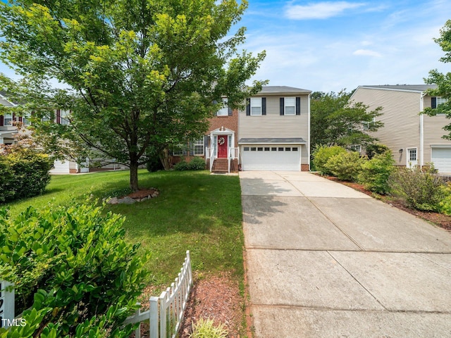 1209 Partington St, Wake Forest, NC 27587 - view of front facade featuring an attached garage, concrete driveway, and brick siding