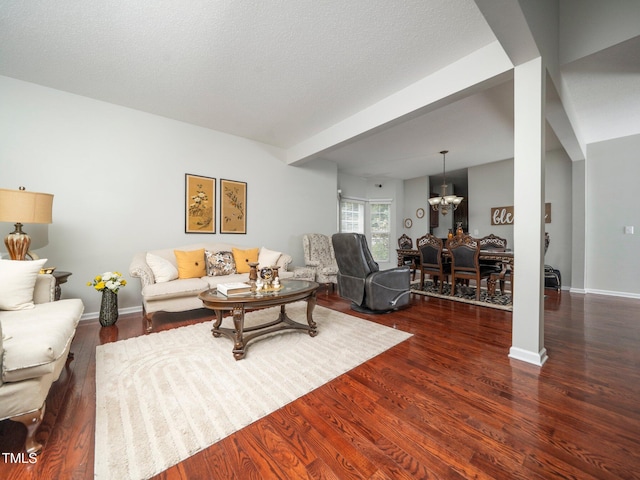 1209 Partington St, Wake Forest, NC 27587 - living area with a chandelier, wood finished floors, and baseboards