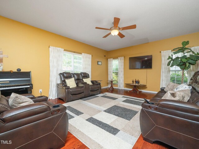 1209 Partington St, Wake Forest, NC 27587 - living room with a ceiling fan, wood finished floors, and baseboards