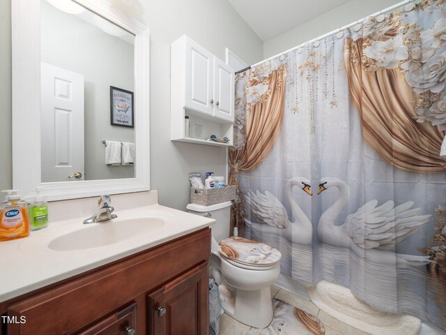 1209 Partington St, Wake Forest, NC 27587 - full bathroom with vanity, toilet, and curtained shower
