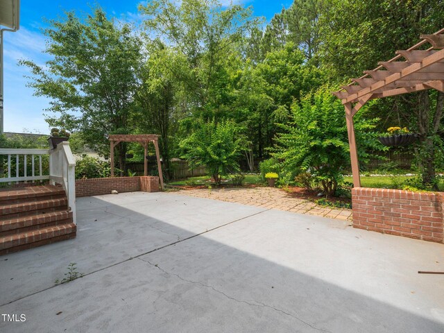 1209 Partington St, Wake Forest, NC 27587 - view of patio featuring a pergola
