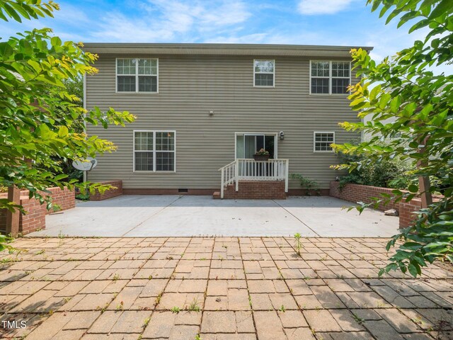 1209 Partington St, Wake Forest, NC 27587 - rear view of property featuring a patio area and crawl space