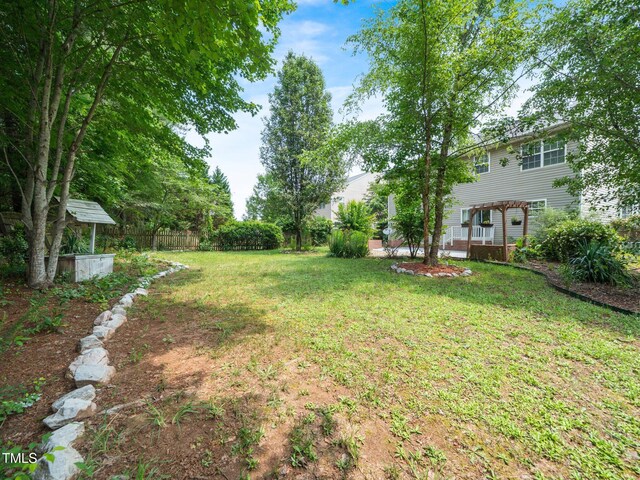 1209 Partington St, Wake Forest, NC 27587 - view of yard featuring a pergola