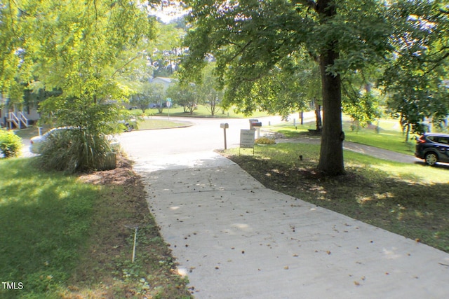 3404 Gemini Dr, Raleigh, NC 27604 - view of community featuring a lawn and driveway
