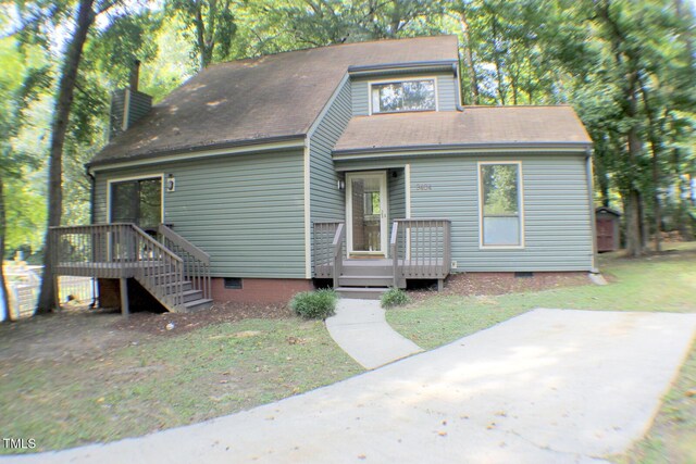3404 Gemini Dr, Raleigh, NC 27604 - view of front of house featuring a chimney, crawl space, a wooden deck, a patio, and a front yard