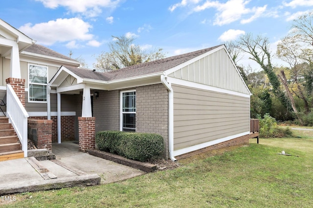 view of property exterior with a yard