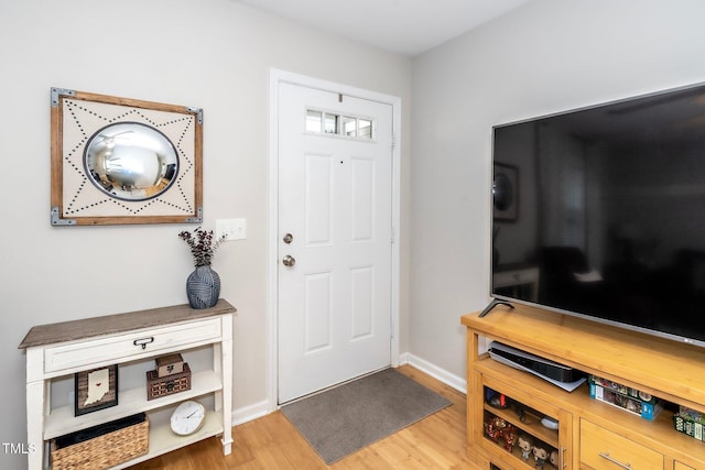 entrance foyer with hardwood / wood-style floors