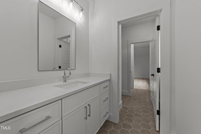 bathroom featuring tile patterned floors and vanity