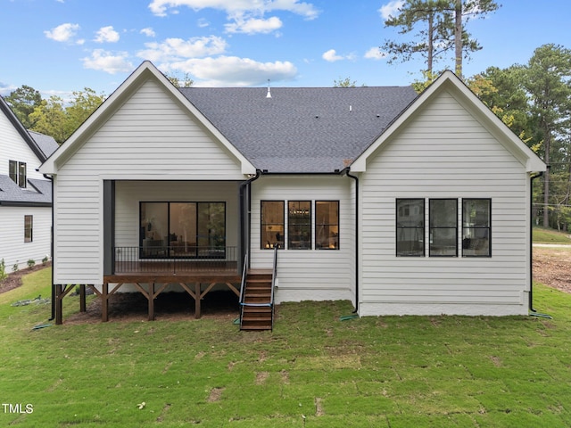 back of house with a yard