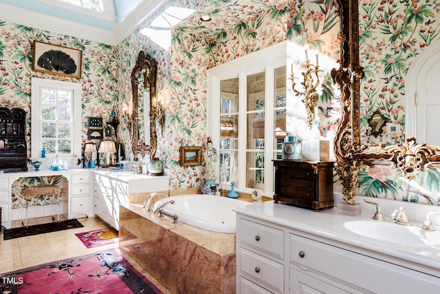 bathroom featuring tile flooring, tiled bath, a skylight, vanity, and crown molding