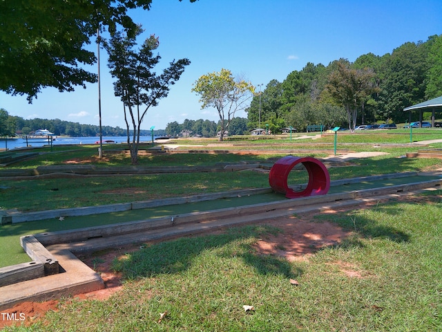 surrounding community featuring a water view