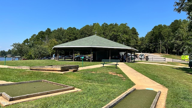 view of home's community featuring a lawn