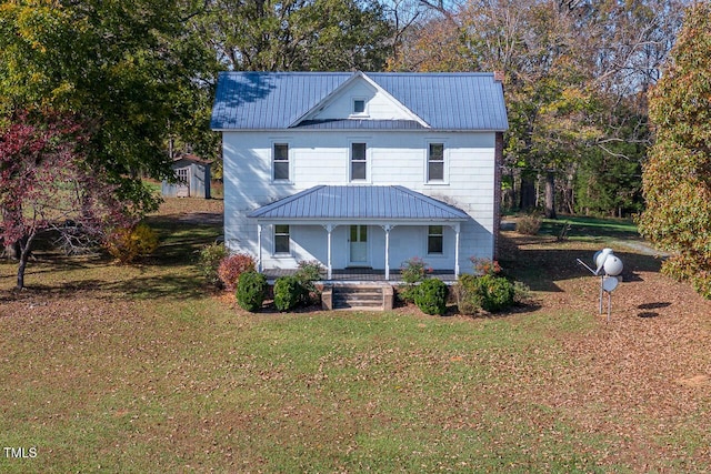 view of front of house with a front lawn and a porch