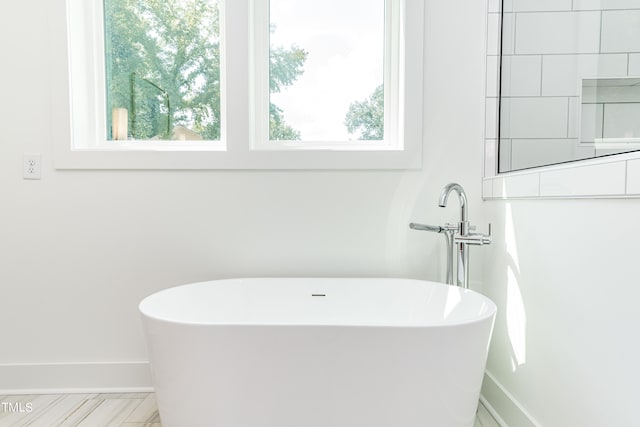 bathroom with tile flooring