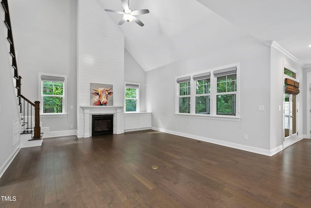 unfurnished living room with high vaulted ceiling, dark hardwood / wood-style flooring, ceiling fan, and ornamental molding