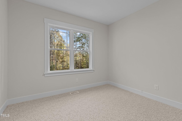 view of carpeted spare room