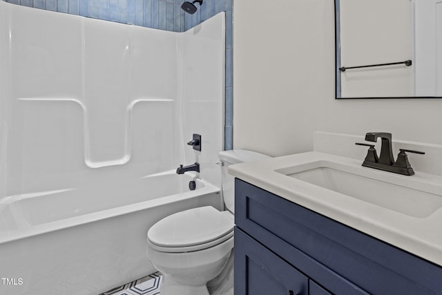 full bathroom featuring  shower combination, toilet, and vanity