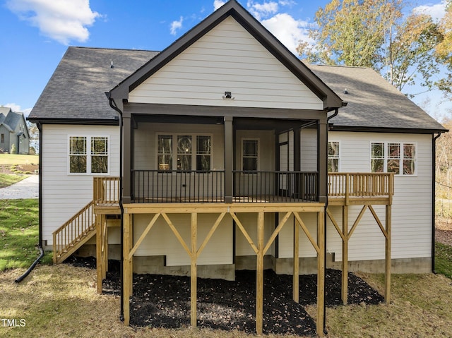 143 Hook Dr Lot 23, Fuquay Varina, NC 27526 - rear view of property with stairway, roof with shingles, and a deck
