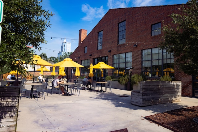 view of community with a patio