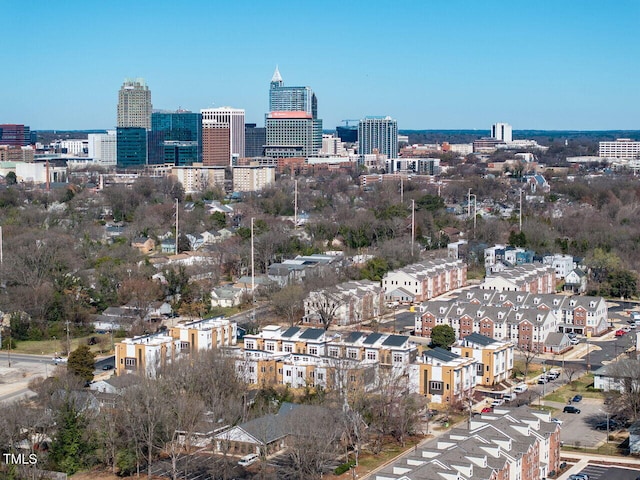 birds eye view of property featuring a city view