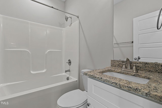 full bathroom with vanity, shower / bath combination, and toilet