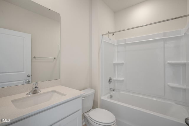 full bathroom featuring toilet, bathtub / shower combination, and vanity