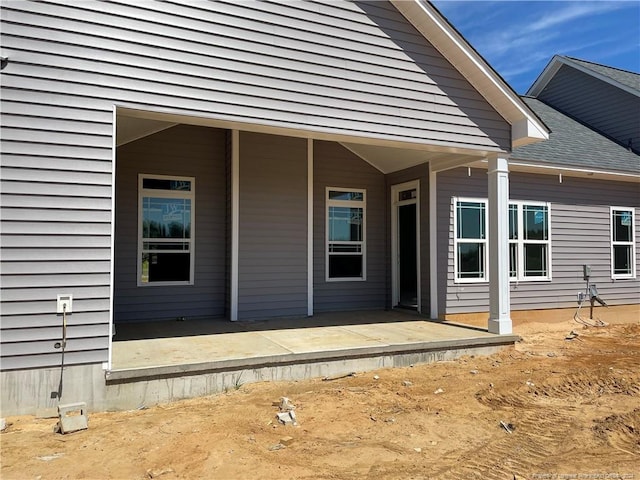 doorway to property featuring a patio area