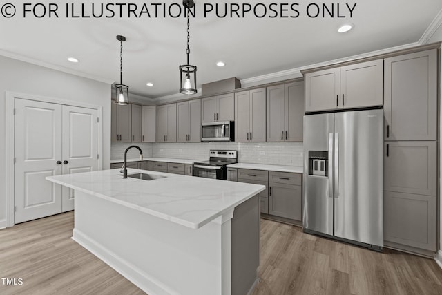 kitchen with appliances with stainless steel finishes, sink, light wood-type flooring, and light stone countertops