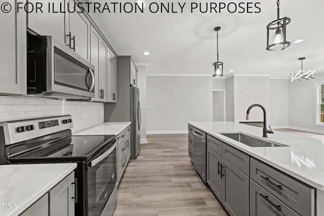 kitchen with sink, ornamental molding, light hardwood / wood-style flooring, gray cabinetry, and stainless steel appliances