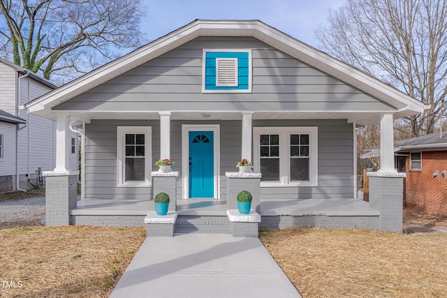 bungalow-style home featuring covered porch