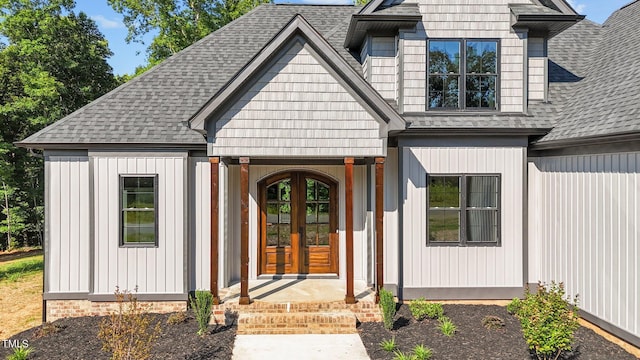 entrance to property featuring french doors