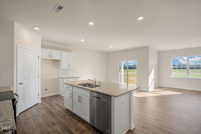 kitchen featuring sink, a kitchen island with sink, dishwasher, and white cabinets