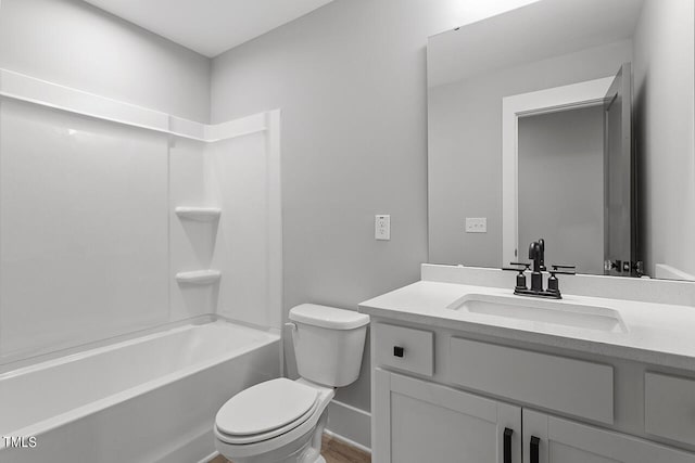 full bathroom with shower / tub combination, vanity, and toilet