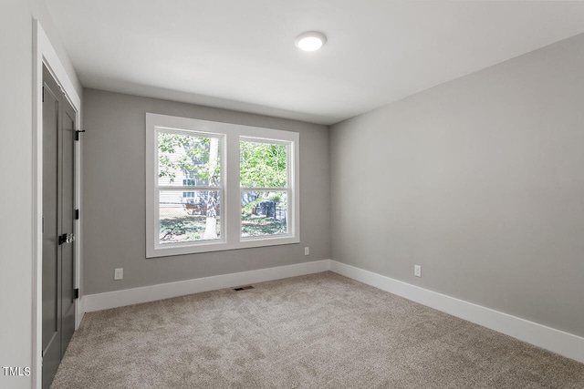 empty room with light carpet