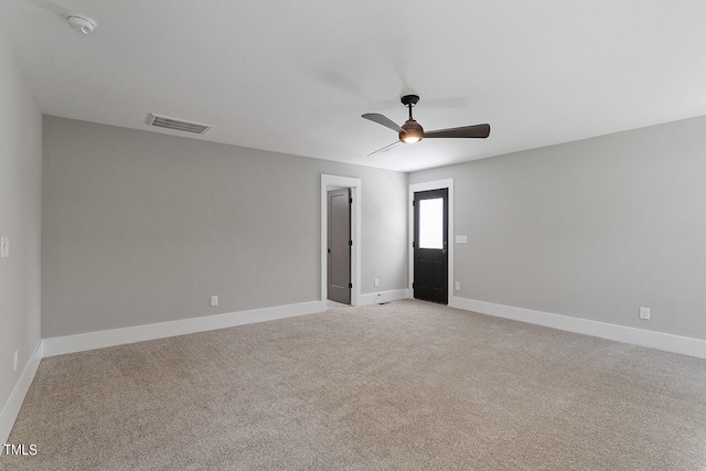 carpeted empty room with ceiling fan