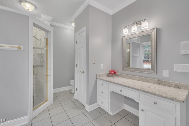 bathroom featuring tile patterned flooring, vanity, and crown molding