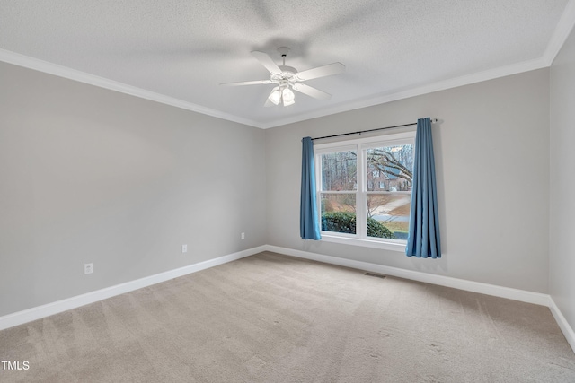 unfurnished room featuring a textured ceiling, carpet floors, and ceiling fan