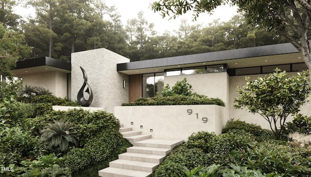 view of front of house with stucco siding