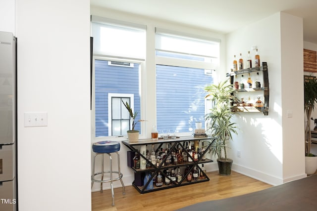 interior space featuring plenty of natural light and light hardwood / wood-style floors