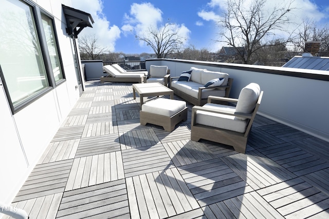 deck with an outdoor hangout area