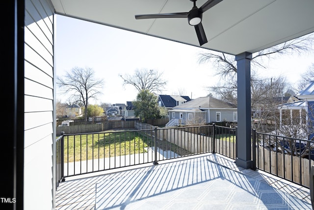 exterior space with ceiling fan