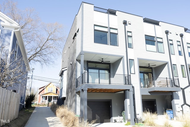 exterior space with a balcony and a garage