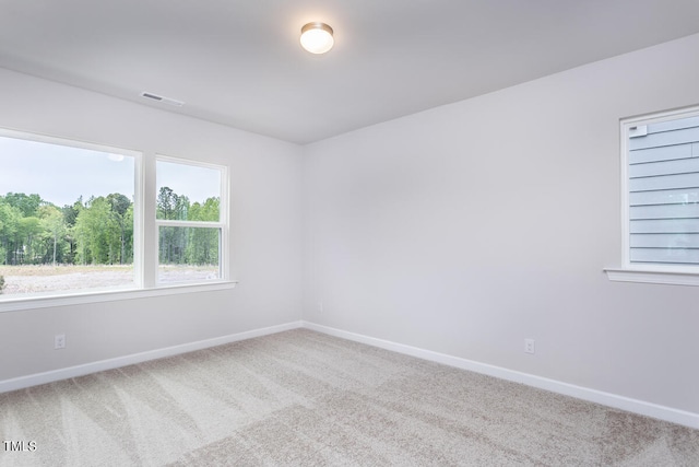 view of carpeted spare room