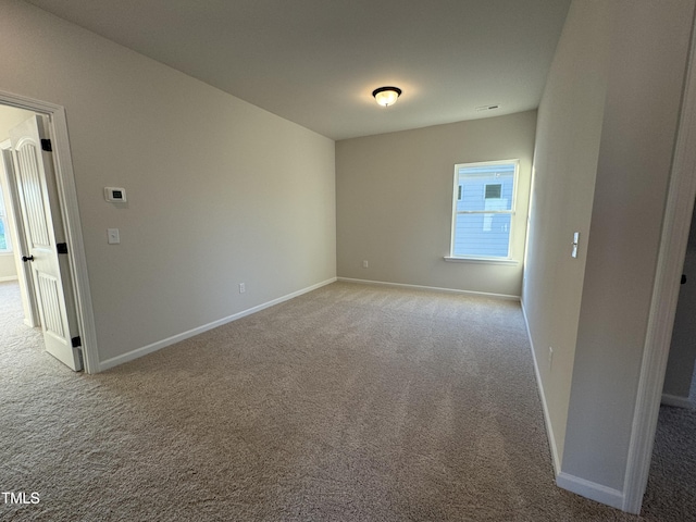 view of carpeted spare room